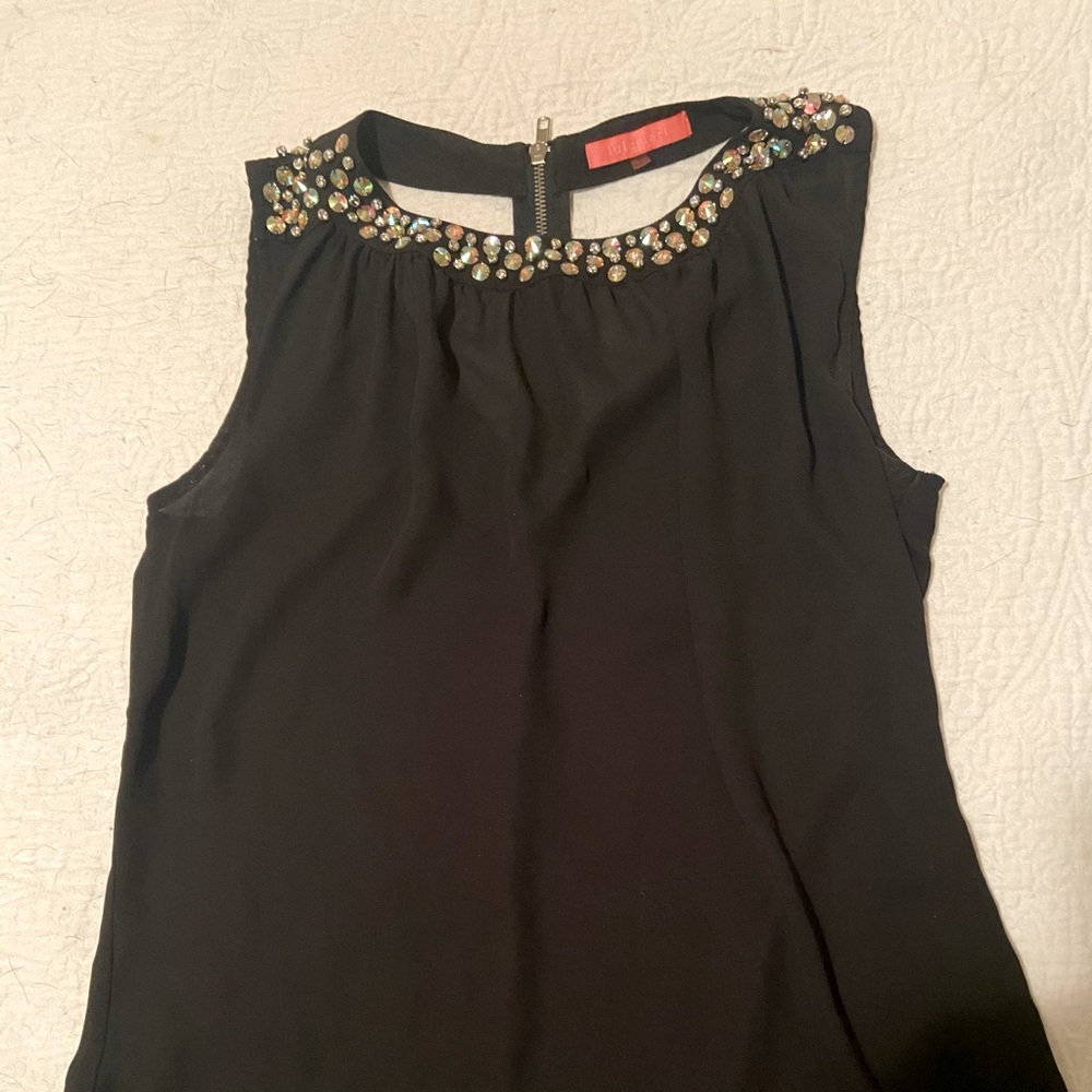 Black sleeveless top